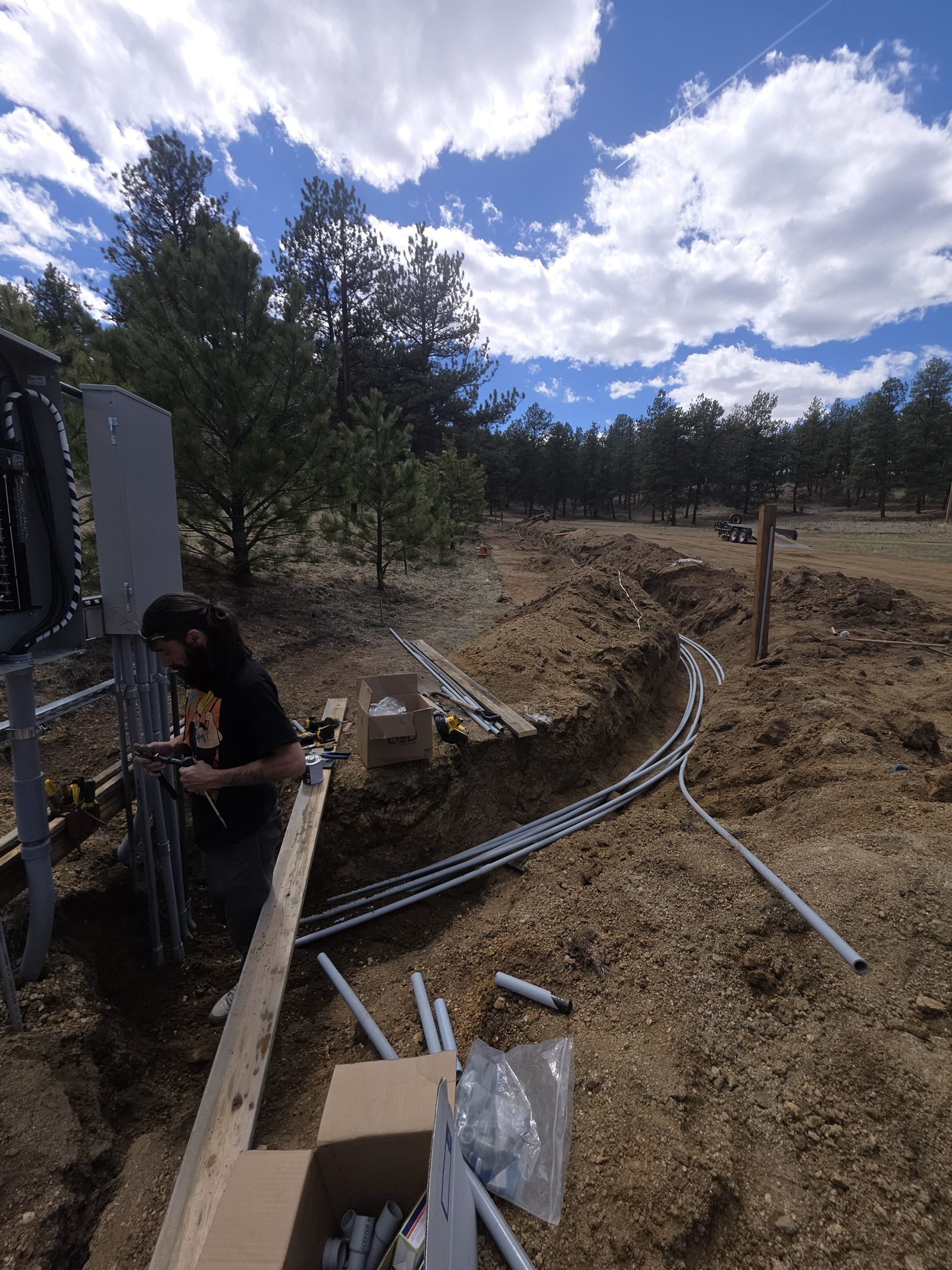 Underground conduit trenching at Camp Alexander